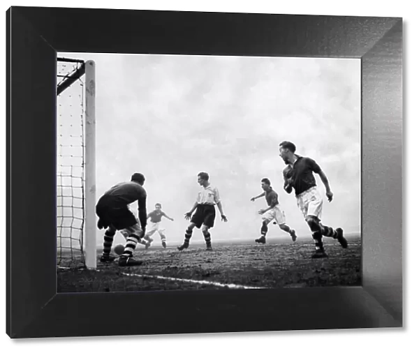 Stoke v. Wrexham: From a cross by Tunnicliffe, Wrexhams outside left