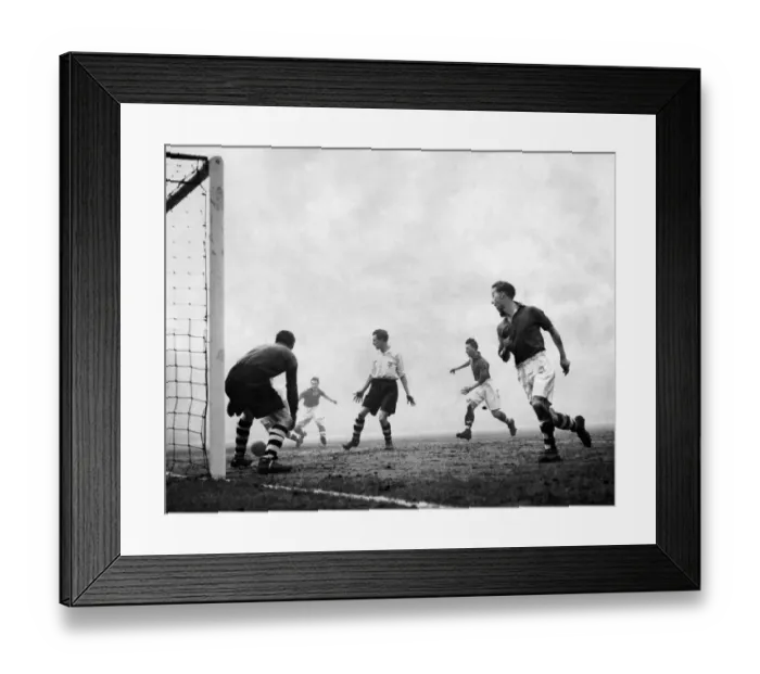 Framed Print : Stoke v. Wrexham: From a cross by Tunnicliffe, Wrexhams outside left