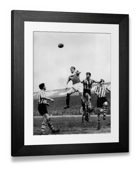 Framed Print : Blackpools Daddy-long-legs-inside-left Dave Durie-outleaps Wednesday defenders Peter