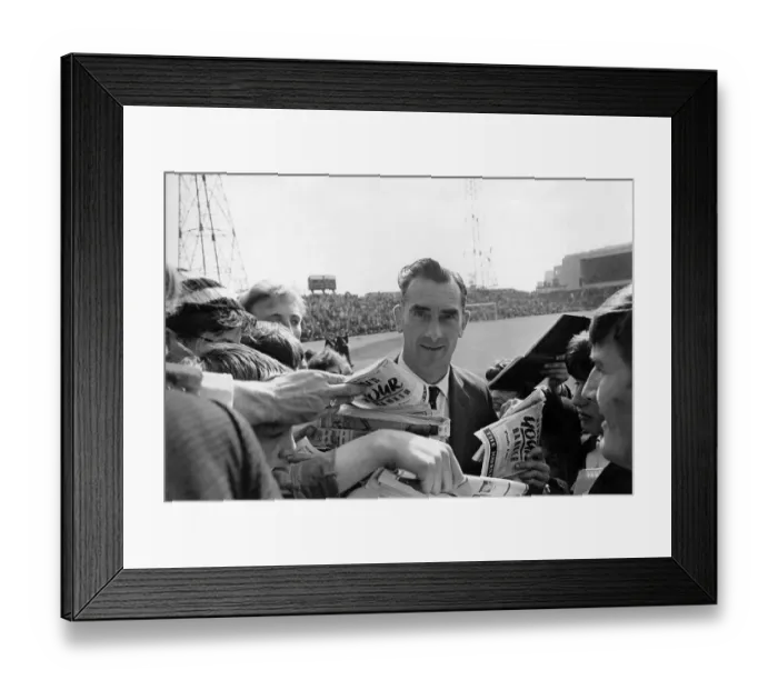 Framed Print : Jackie Milburn at St Jamess Park, Newcastle, surrounded by kids wanting his