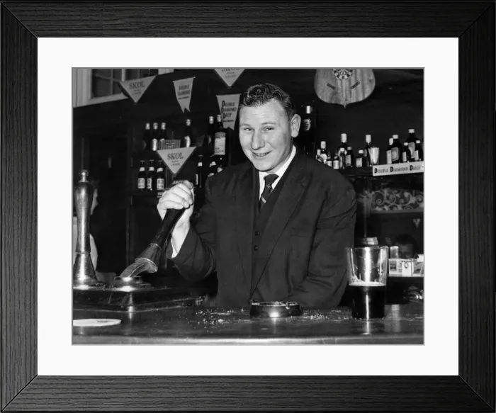 Framed Print : Former Scottish international goalkeeper Tommy Younger keeps fit pulling pints in his Framed Print : Former Scottish international goalkeeper Tommy Younger keeps fit pulling pints in his