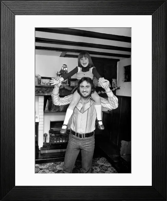 Framed Print : Sport / Football: Footballer: Frank Lampard (Senior) with one of his daughters Framed Print : Sport / Football: Footballer: Frank Lampard (Senior) with one of his daughters