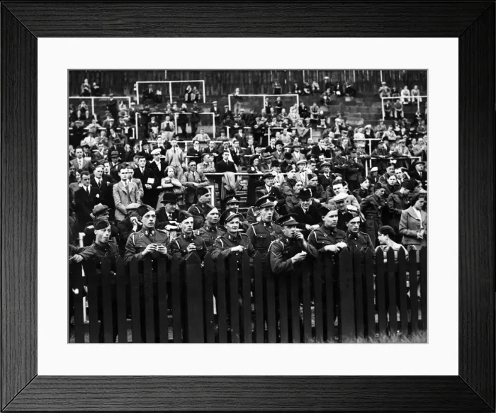 Framed Print : Soldiers watching a game of football shortly after the outbreak of the Second World war Framed Print : Soldiers watching a game of football shortly after the outbreak of the Second World war