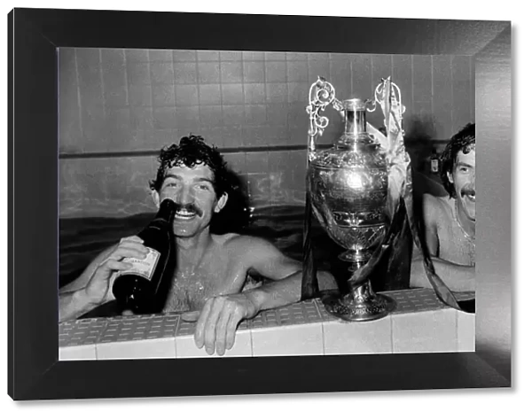 Champagne and a bath for Graeme Souness and Terry McDermott of Liverpool after today
