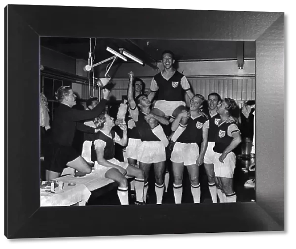 Ken Brown of West Ham picked to play for England. Being chaired by other members of