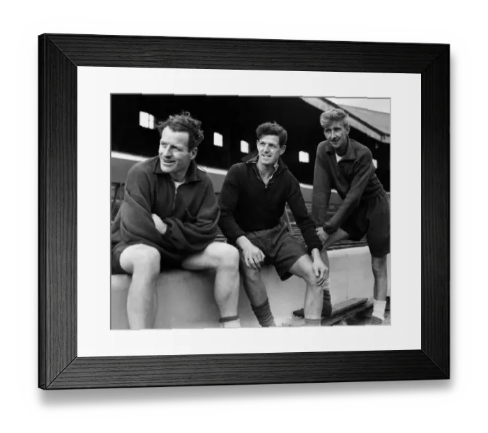 Framed Print : Bill Holden trains on Blackburn Rovers ground. Bill Holden (centre