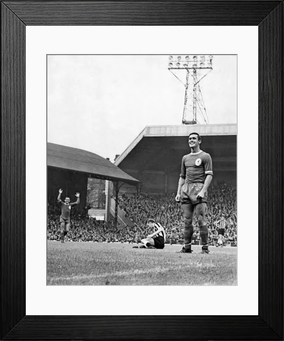 Framed Print : Liverpool v. Newcastle. Tony Hateley stands proudly looking into the goal after scoring Framed Print : Liverpool v. Newcastle. Tony Hateley stands proudly looking into the goal after scoring