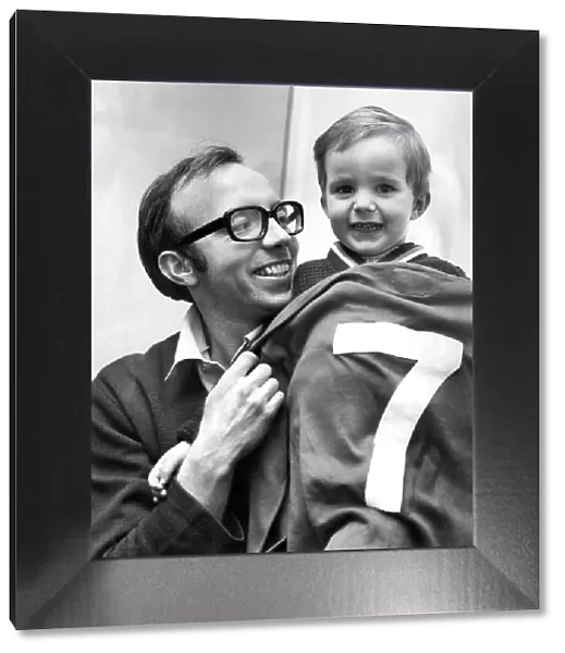 Childs play... Nobby Stiles shows son Peter, aged 2 1  /  2