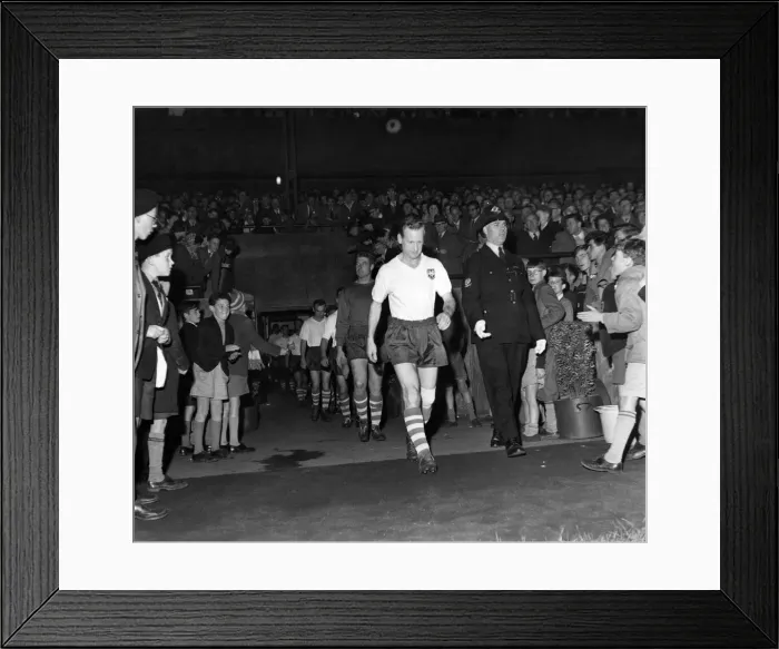Framed Print : Tom Finneys Testimonial Match. Tom leads his team on to the fiels