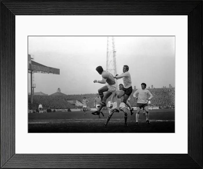 Framed Print : Manchester City v. Leeds United. The ball beats both Booth
