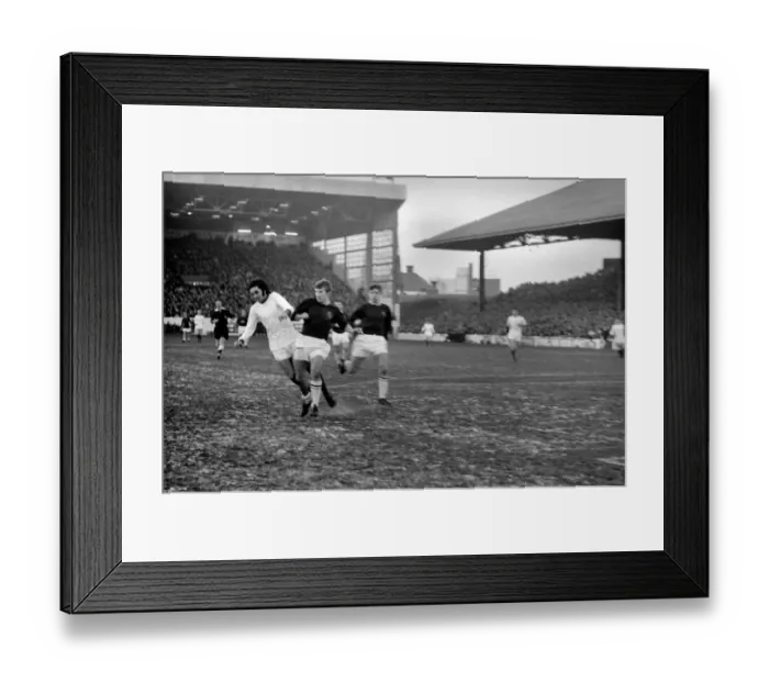 Framed Print : Sport. Football: Burnley v. Man United. Best - Un. shoots for goal but Burnley keeper