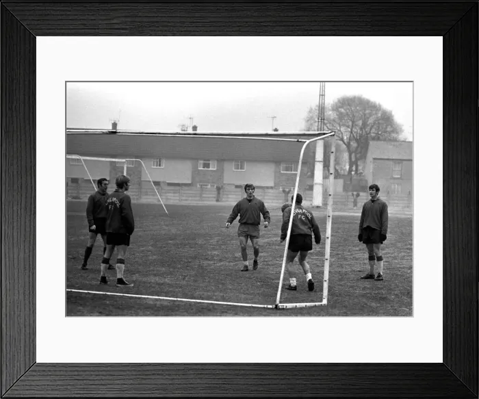 Framed Print : St. John, Wall, Graham and Evans with boss between the sticks druring training at their