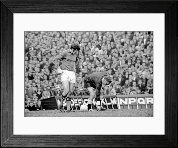 Framed Print : Arsenal v. Manchester City. Joe Corrigon City goalie points at coins that have been onto