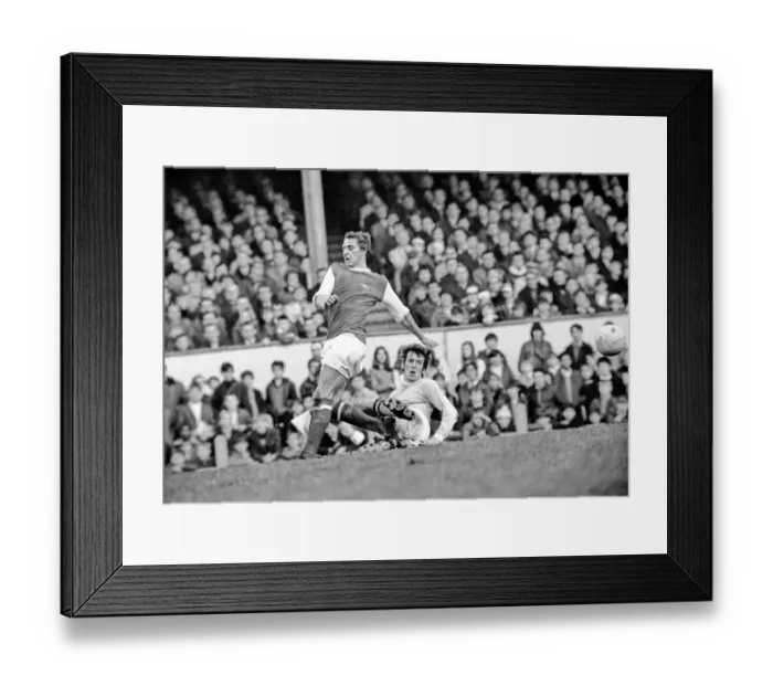 Framed Print : Arsenal v. Manchester City. Booth City centre half beats Arsenal Rodford (left)