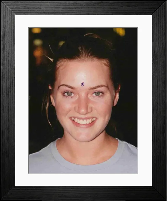 Framed Print : Actress Kate Winslet leaving Heathrow June 1998 for Australia where she is take