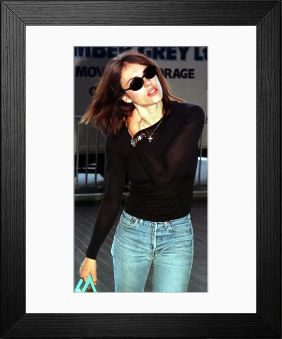Framed Print : Liz Hurley September 1998 Actress at London Heathrow Airport leaving for flight to New Framed Print : Liz Hurley September 1998 Actress at London Heathrow Airport leaving for flight to New