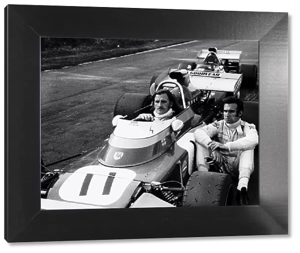 Graham Hill in racing car Brands Hatch after hearing of death of Jo Siffert