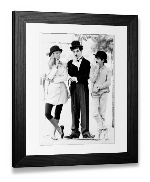 Framed Print : Twiggy model and actress with wax work of Charlie Chaplin