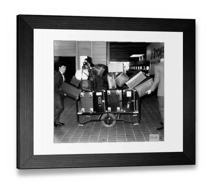 Framed Print : Joan Collins Actress gets porters at Heathrow Airport to move her Luggage Framed Print : Joan Collins Actress gets porters at Heathrow Airport to move her Luggage