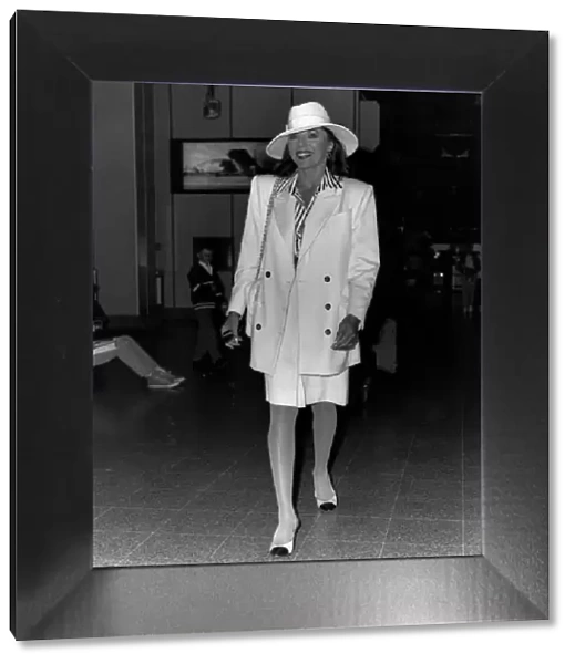 Joan Collins Actress at Airport departing for Atlanta Georgia USA
