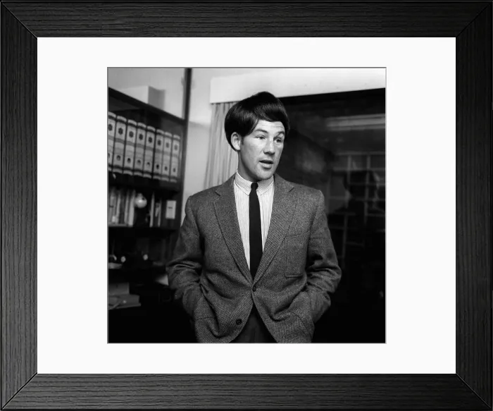 Framed Print : British motor racing driver Stirling Moss wearing a Beatles wig, November 1963 Framed Print : British motor racing driver Stirling Moss wearing a Beatles wig, November 1963