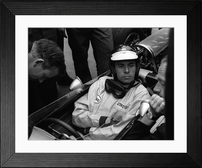 Framed Print : Jim Clarke before the start of the British Grand Prix at Silverstone which he won in his Framed Print : Jim Clarke before the start of the British Grand Prix at Silverstone which he won in his