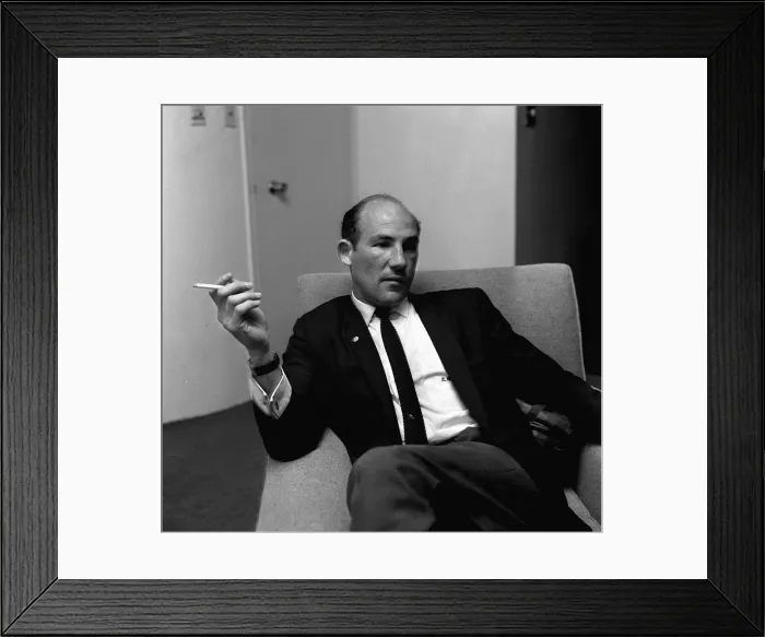 Framed Print : Stirling Moss in his London office May 1964