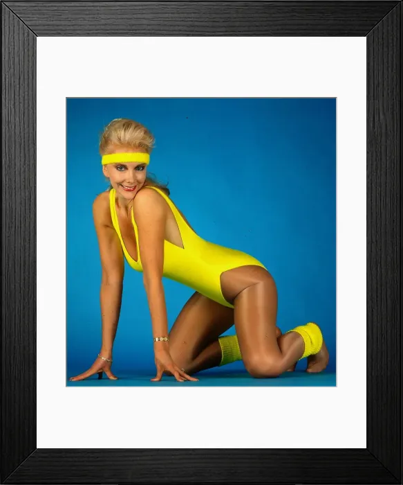 Framed Print : Caroline Dunn actress January 1991 kneeling on floor wearing yellow leotard and headband Framed Print : Caroline Dunn actress January 1991 kneeling on floor wearing yellow leotard and headband