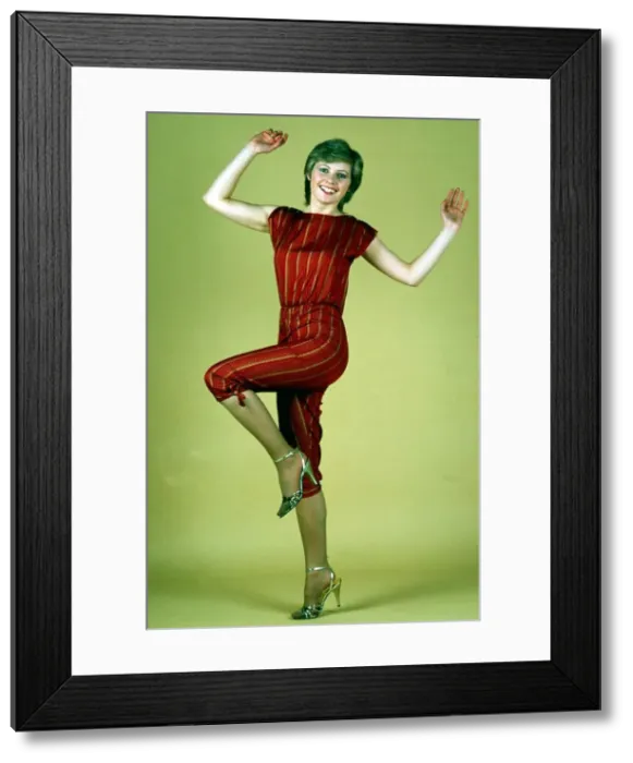 Framed Print : Dee Hepburn wearing red and gold outfit February 1982 Framed Print : Dee Hepburn wearing red and gold outfit February 1982