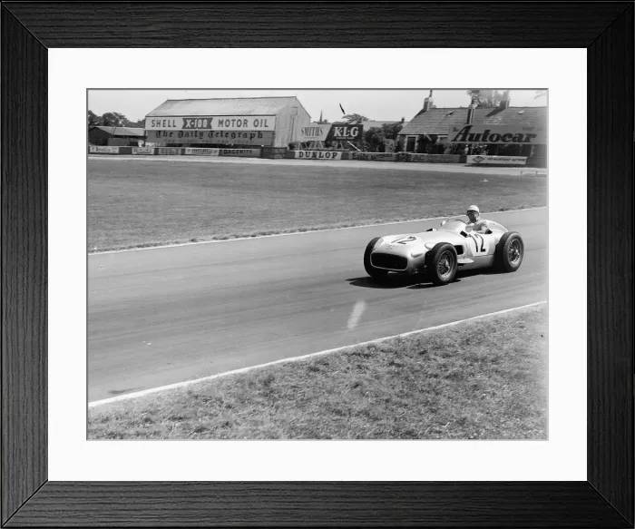 Framed Print : Stirling Moss winner of the British Grand Prix at Aintree in Liverpool 1955
