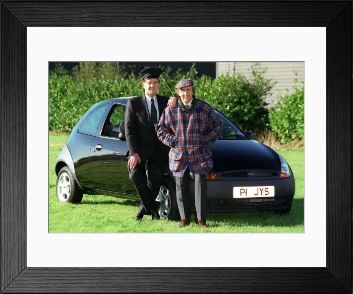 Framed Print : Jackie Stewart and driver Gerry Webb January 1998 Ford Ka car