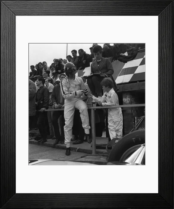 Framed Print : Graham Hill motor racing driver with son Damon Hill at Silverstone 1967 Framed Print : Graham Hill motor racing driver with son Damon Hill at Silverstone 1967