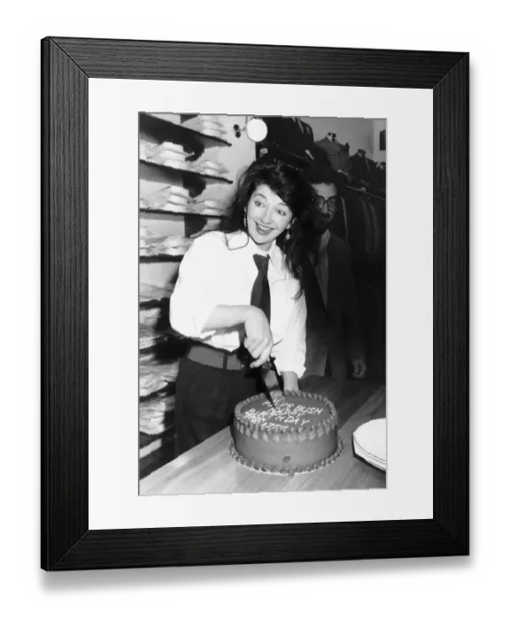 Framed Print : Pop singer Kate Bush cuts her 30th birthday cake at Blazers Boutique where she was Framed Print : Pop singer Kate Bush cuts her 30th birthday cake at Blazers Boutique where she was