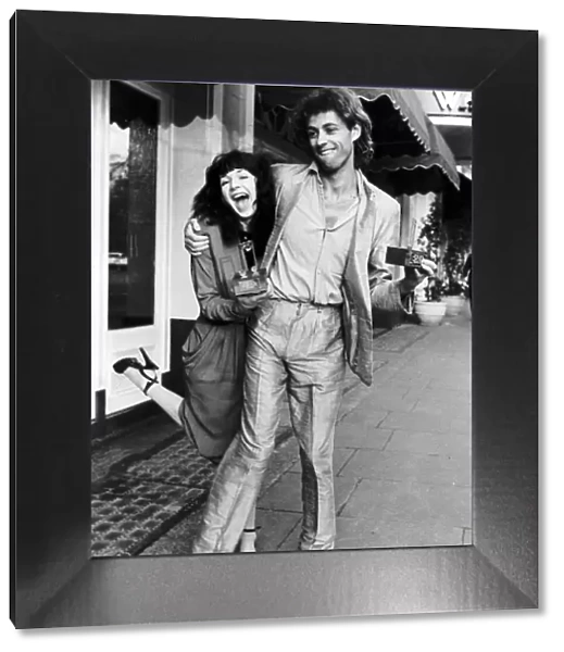 Bob Geldof and Kate Bush Both Collected The Award For Best Single Dbase