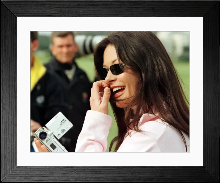 Framed Print : Catherine Zeta Jones October 1999 at St Andrews for Dunhill Cup golf tournament Framed Print : Catherine Zeta Jones October 1999 at St Andrews for Dunhill Cup golf tournament
