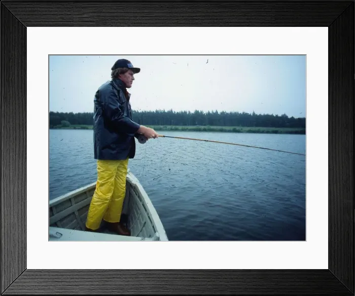Framed Print : Andy Bean golfer August 1978 Standing in rowing boat fishing angling waterproofs Framed Print : Andy Bean golfer August 1978 Standing in rowing boat fishing angling waterproofs