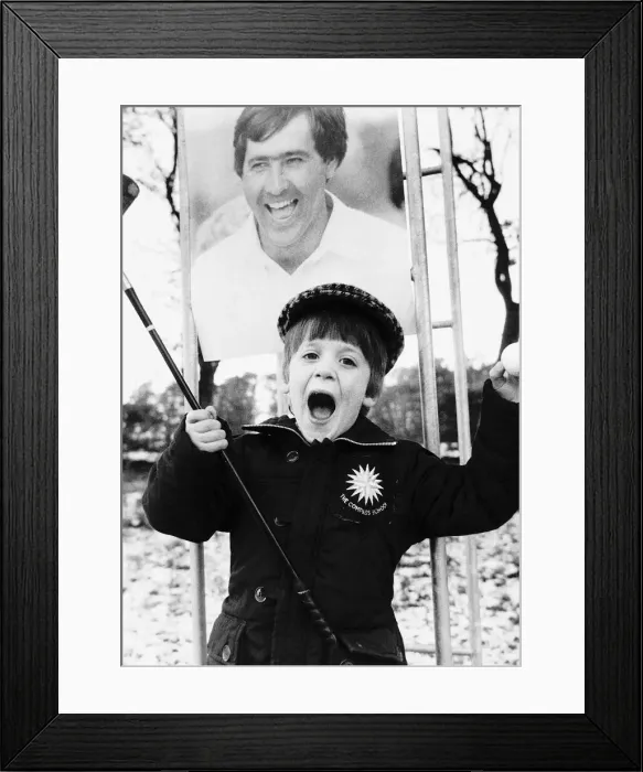 Framed Print : Charles Simpson young boy golfer lesson from picture of Seve Ballesteros holding golf Framed Print : Charles Simpson young boy golfer lesson from picture of Seve Ballesteros holding golf