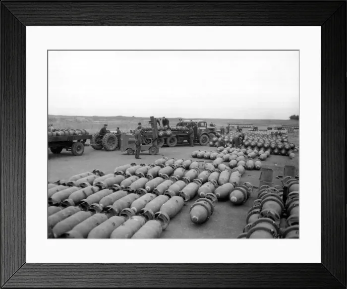 Framed Print : Loaded bomb trains leaving the dumps at an RAF Bomber Command Station during preparations Framed Print : Loaded bomb trains leaving the dumps at an RAF Bomber Command Station during preparations