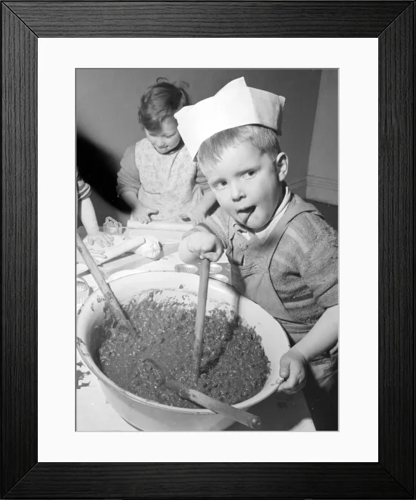 Framed Print : Timothy Walker seen here stirring the Christmas Pudding at a Bristol Day Nursery Framed Print : Timothy Walker seen here stirring the Christmas Pudding at a Bristol Day Nursery