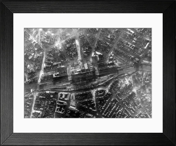 Framed Print : An aerial view showing the bomb damage in the German city of Hanover after an RAF bombing Framed Print : An aerial view showing the bomb damage in the German city of Hanover after an RAF bombing