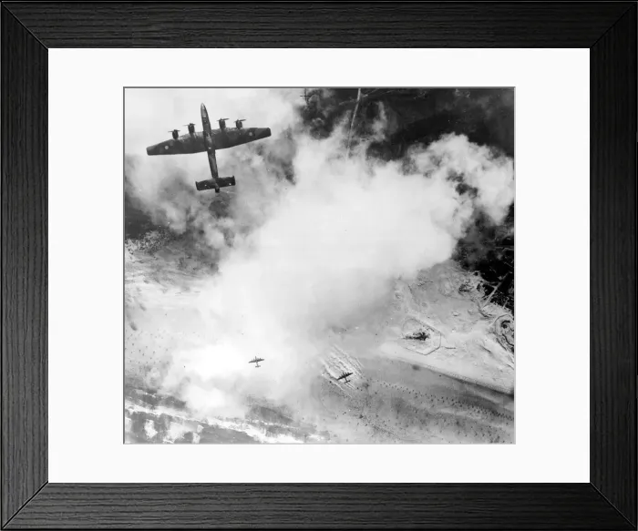 Framed Print : A four engined Halifax bomber attacking fortified positions at Calais in Northern France Framed Print : A four engined Halifax bomber attacking fortified positions at Calais in Northern France