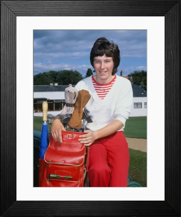 Framed Print : Wilma Aitken Golfer holding golf bag 1980 Framed Print : Wilma Aitken Golfer holding golf bag 1980
