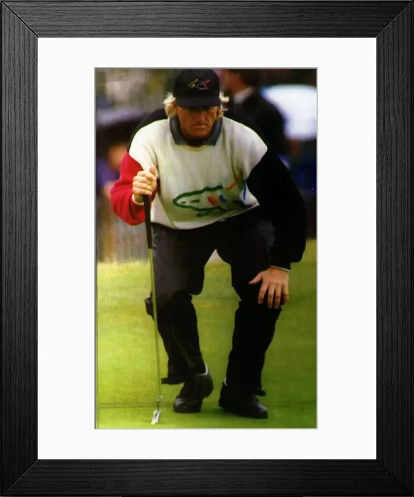 Framed Print : Greg Norman Australian golfer lining up a put Framed Print : Greg Norman Australian golfer lining up a put