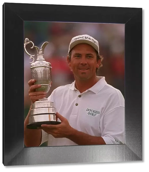 Tom Lehman holds claret jug trophy British Open golf champion Lytham Dockers cap