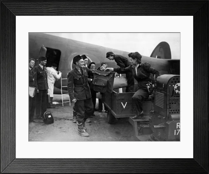 Framed Print : Young RAF air crews delivering a Liberator aircraft at Atlantic Terminal after flying Framed Print : Young RAF air crews delivering a Liberator aircraft at Atlantic Terminal after flying