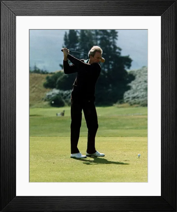Framed Print : Clint Eastwood actor swinging driver teeing off golf Kings course Gleneagles Framed Print : Clint Eastwood actor swinging driver teeing off golf Kings course Gleneagles