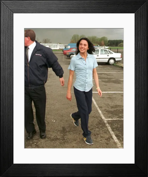 Framed Print : Mel C Sporty Spice April 1998 walks across the car park as she prepares to leave