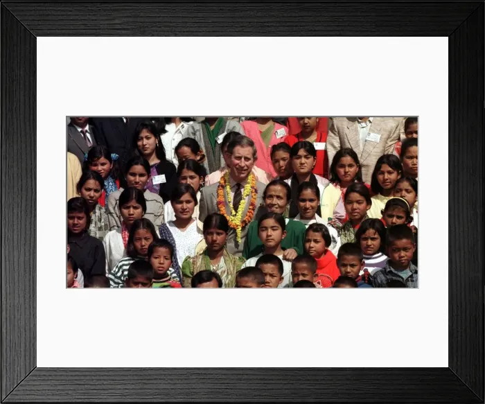 Framed Print : Prince Charles poses with young Nepalese children February 1998 Following his Framed Print : Prince Charles poses with young Nepalese children February 1998 Following his