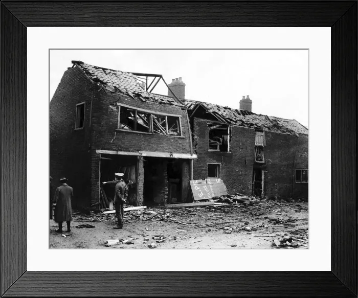 Framed Print : Air Raid Great Yarmouth as house is destroyed by German bomb during the World War I Framed Print : Air Raid Great Yarmouth as house is destroyed by German bomb during the World War I