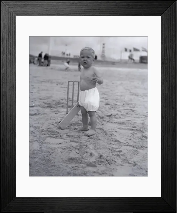 Framed Print : The next Jack Hobbs stands at the crease ready to bat in a game of beach cricket Framed Print : The next Jack Hobbs stands at the crease ready to bat in a game of beach cricket